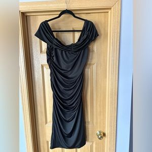Off the shoulder , gathered and stretchy evening dress.